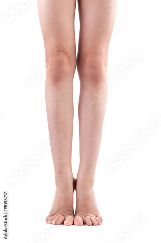 Two human legs standing on tiptoe