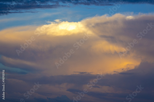 Light and orange sunset in the clouds over Bolivia