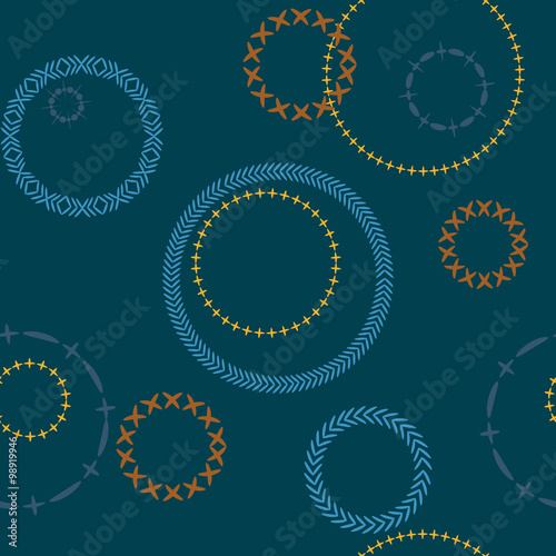 Bright seamless pattern with embroidered image of laps, seams, stitches for the style hippie boho, ethnic and denim style. Modern design, best for prints on textiles and paper.