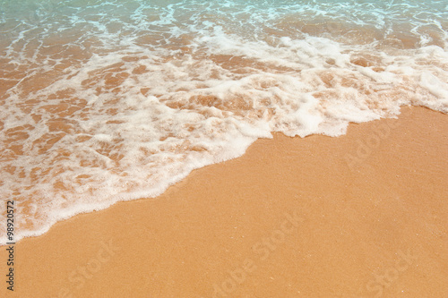 Wave of the sea on the sand beach
