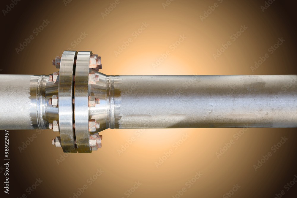 Metal pipe flanges with bolts on an isolated background, Pipe line in oil and gas industry and installed in plant or process. Metal pipe flanges with bolts on an isolated background, Pipe line in oil and gas industry and installed in plant or process.