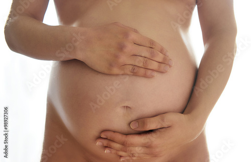 Belly of a pregnant woman © SianStock