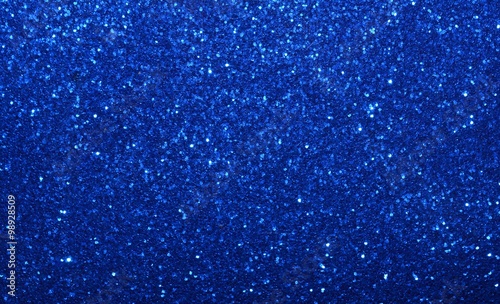 Sparkling glittering twinkling festive shiny blue abstract background, backdrop.