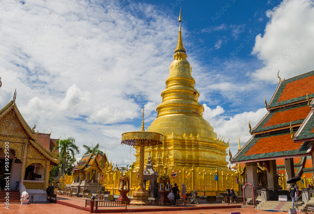 Fototapeta premium Golden stupa with church