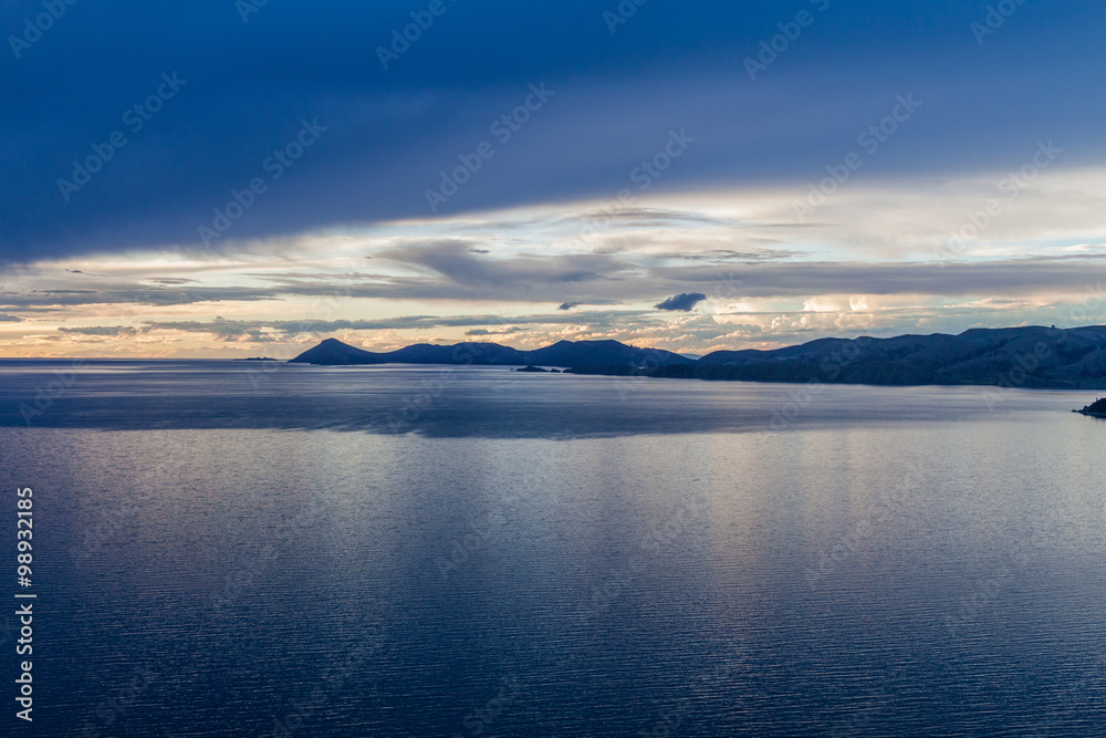 Fototapeta premium Sunset over Titicaca lake, behind Isla del Sol, Bolivia