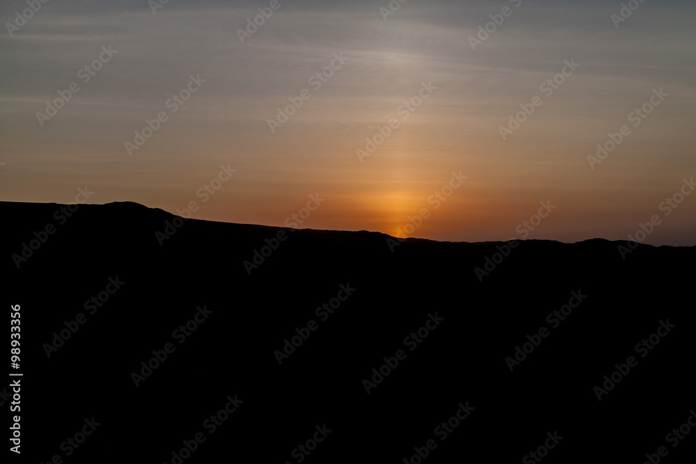 Sunset behind the sand dunes near Huacachina oasis, Peru Sunset behind the sand dunes near Huacachina oasis, Peru
