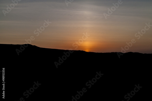 Sunset behind the sand dunes near Huacachina oasis  Peru