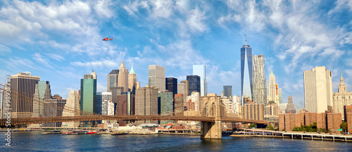 Manhattan skyline panorama with Brooklyn Bridge in New York City, United States