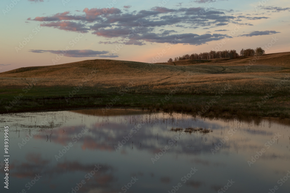 Lake in the steppe at sunset. Southern Urals. Bashkiria. Russia.