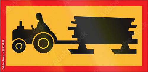 Road sign used in Sweden - Forestry vehicle crossing ahead