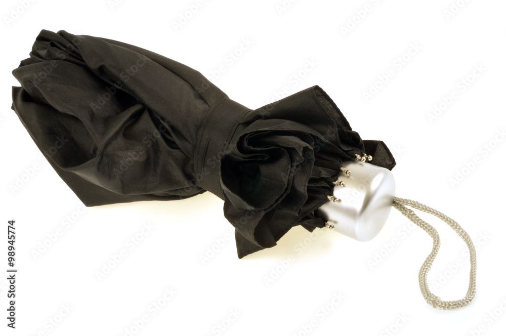 Parapluie noir replié Parapluie noir replié