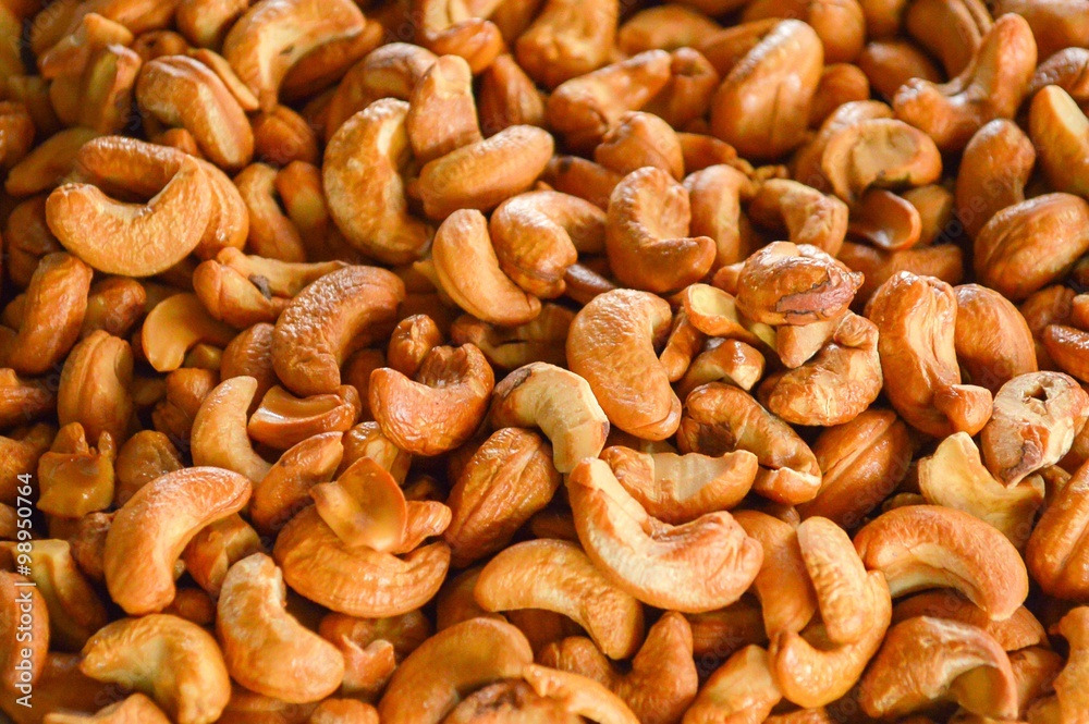 Cashew nuts arranged at the background Cashew nuts arranged at the background