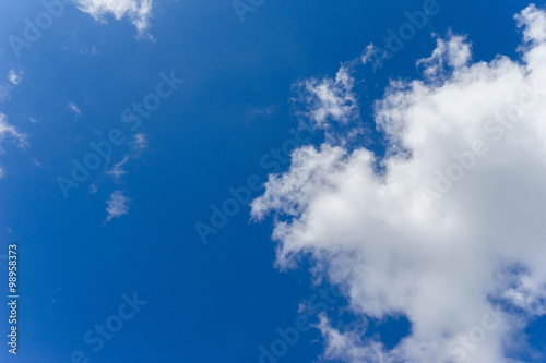 White cloud in the blue sky, view from bottom up © shanekittikul