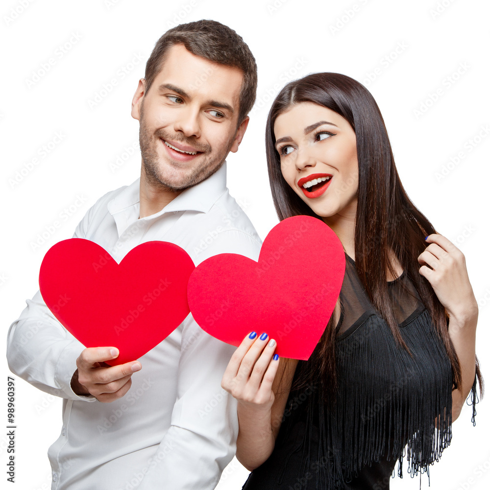 Young beautiful couple with present isolated on white