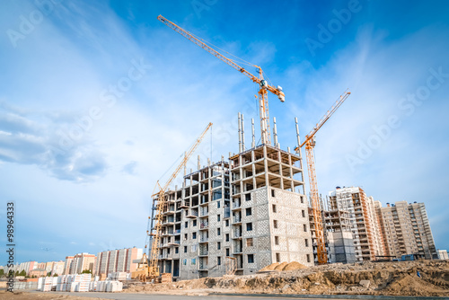 Construction of new apartments and crane photo