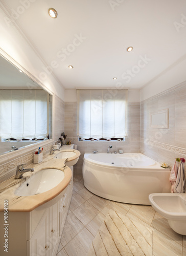 Bathroom of a modern apartment  marble cladding