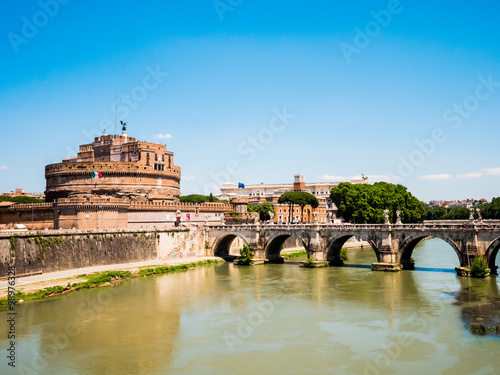 The Mausoleum of Hadrian day view (Castel Sant’Angelo) in Rome, Italy. You also see the Bridge of Hadrian to the right, crossing the Tiber river.