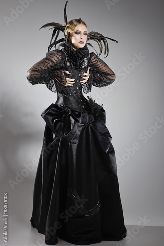 Extravagant lady in a black dress
