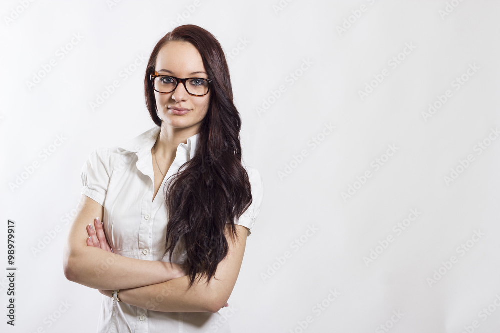 Beautiful businesswoman keeping arms crossed