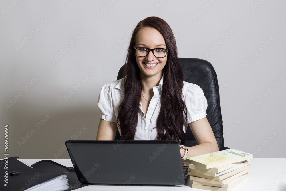 Young beautiful businesswoman at office Young beautiful businesswoman at office