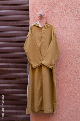 Obraz na płótnie Djellaba - traditional long, loose-fitting unisex outer robe. w salonie