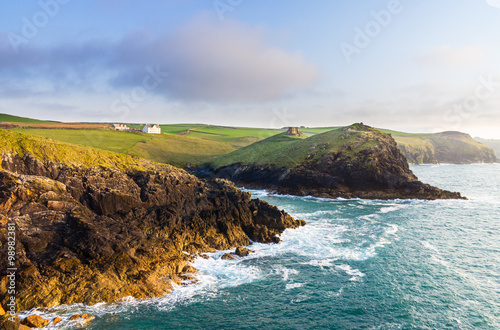 Doyden Castle in panorama of Cornwall coastline photo