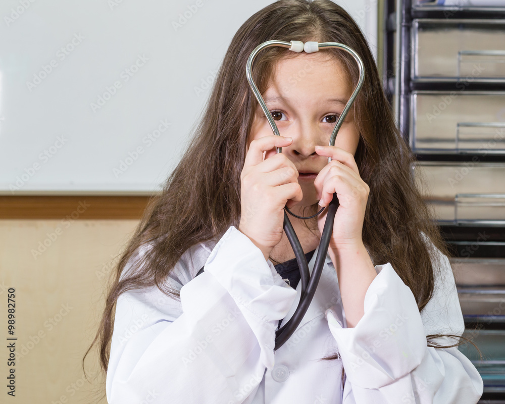Child doctor with a stethoscope Child doctor with a stethoscope