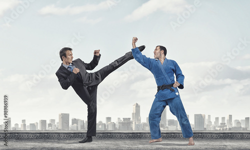 Karate man in blue kimino