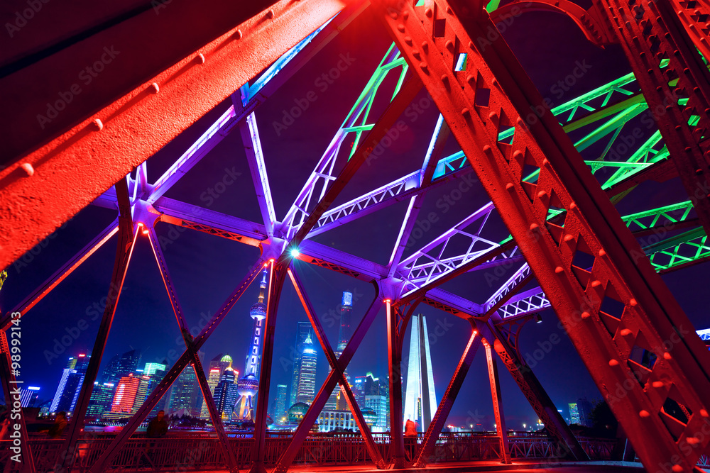 Fototapeta premium Shanghai skyscrapers across Garden Bridge at night, China