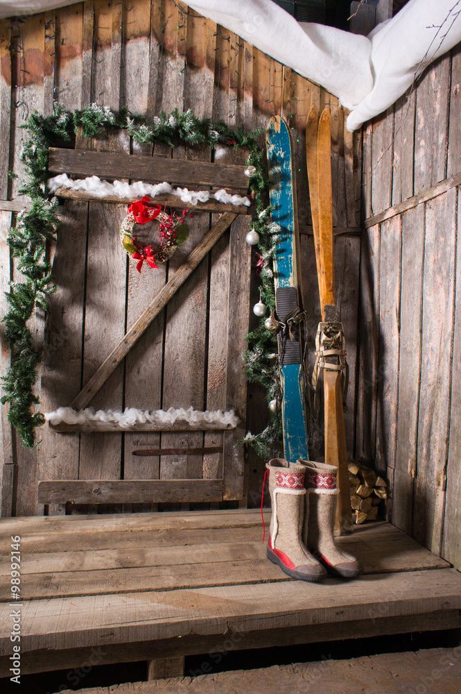 Fototapeta premium wooden skis standing near the porch