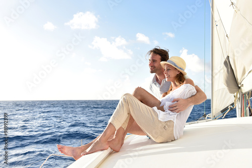 Romantic couple enjoying sail cruise on Caribbean sea © goodluz