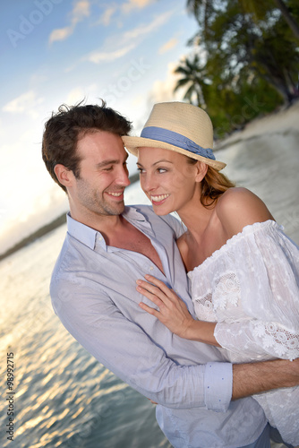 Portrait of cheerful couple on vacation in Caribbean island