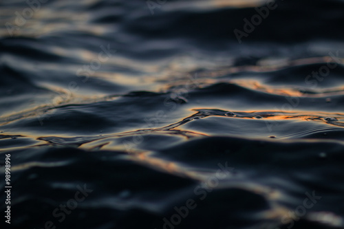 Blurred dark blue sea water