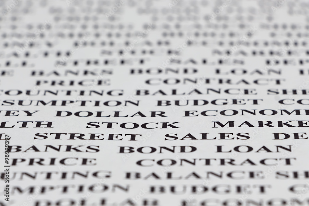 Economy or finance terms background on white office paper. Economy or finance terms background on white office paper.