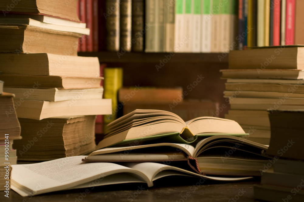library with a lot of books on shelves and ask
library with a lot of books on shelves and ask
