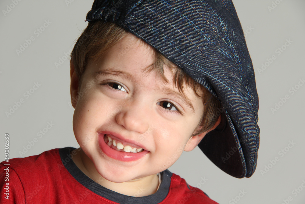 Toddler wearing cap