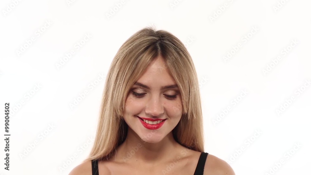 Beauty woman eating fresh and juicy apple at white background Beauty woman eating fresh and juicy apple at white background