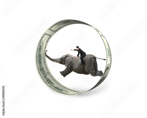 Man pointing finger riding elephant running in dollar bills circ