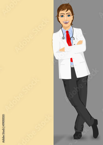 male doctor with glasses leaning against a blank board 