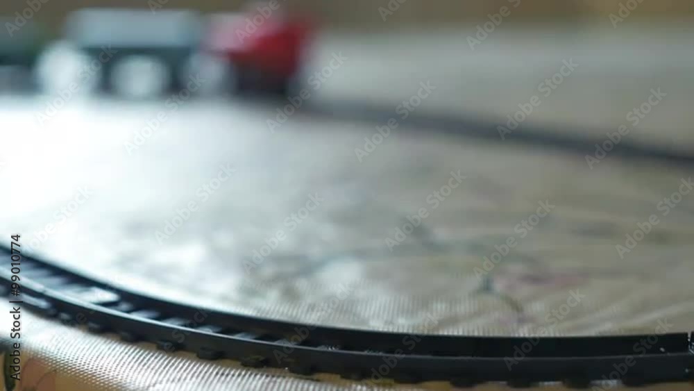 Childs toy train moving around its track can be looped