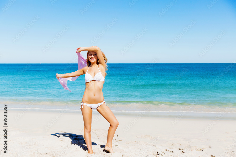 Young woman relaxing on the beach