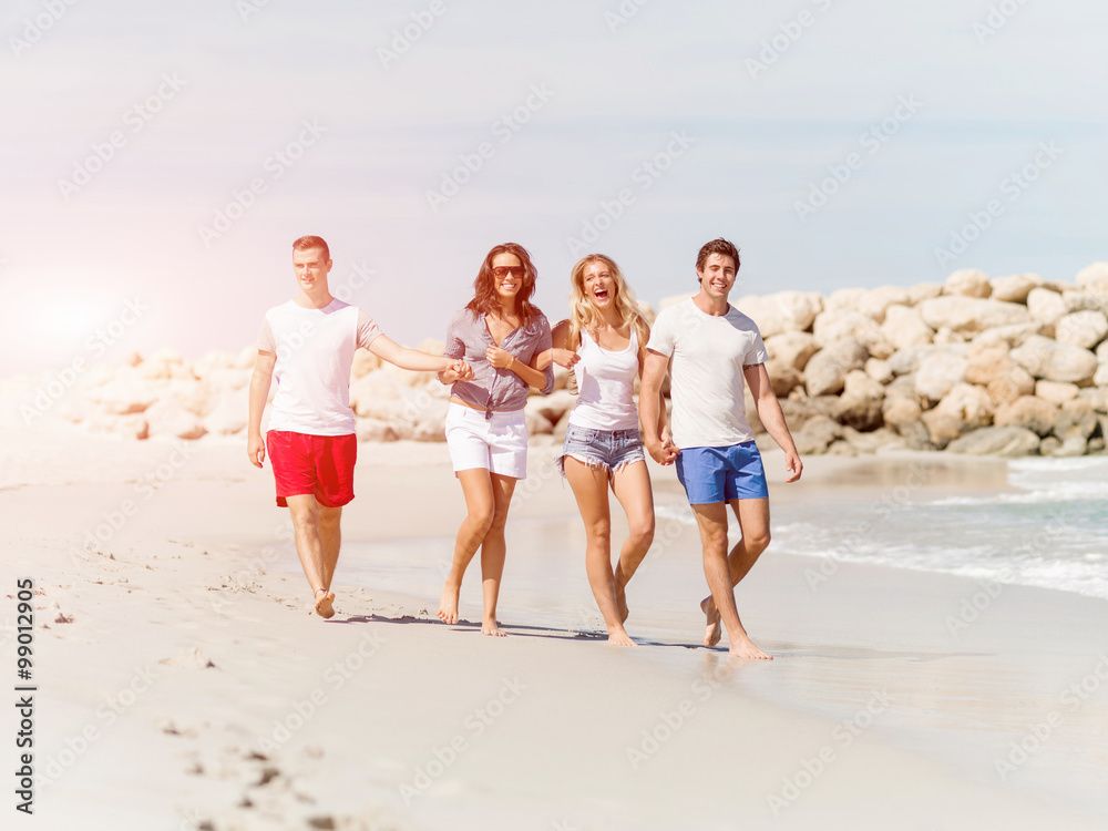 Company of young people on the beach Company of young people on the beach