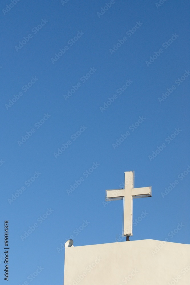 White church cross with blue sky White church cross with blue sky