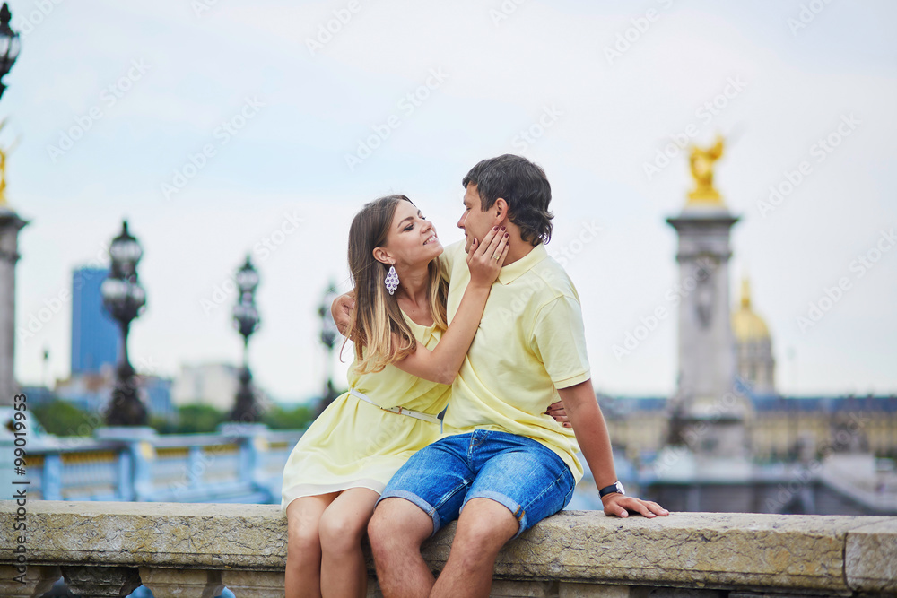 Beautiful young dating couple in Paris