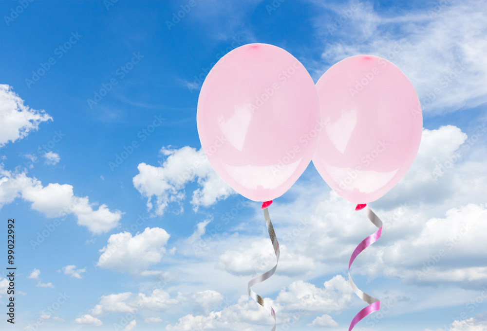 pink baloons in the sky