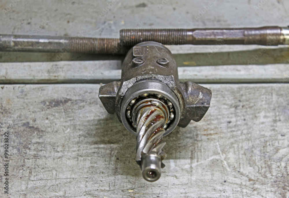 The damaged detail of the steering mechanism The damaged detail of the steering mechanism