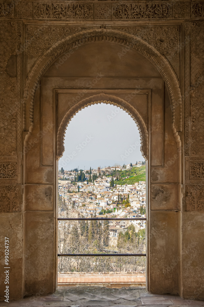 Nice arch door in ancient Arabian palace Alhambra. Granada, Spain