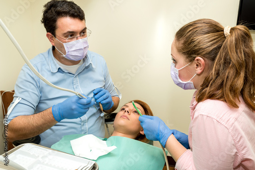 Dentist doing a dental treatment on a patient