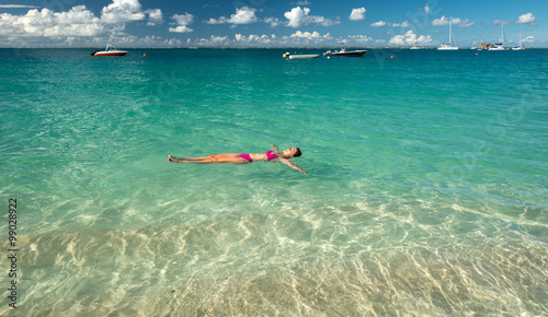 Woman relax in a Caribbean beach © forcdan