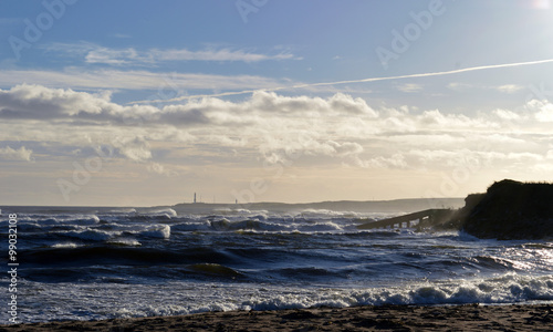 Waves at Donmouth estuary, Aberdeen, Scotland photo